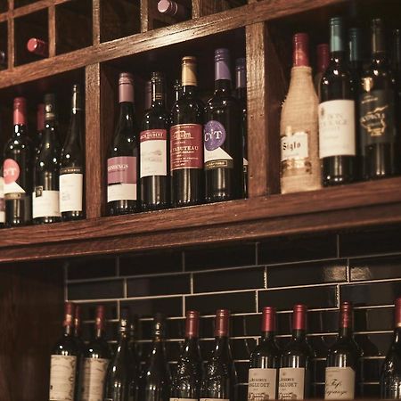 The Lord Grenfell Bed & Breakfast Maidenhead Bagian luar foto Wine bottles in a wine rack